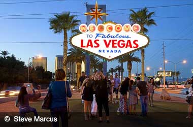 Tourists visiting Welcome to Fabulous Las Vegas sign